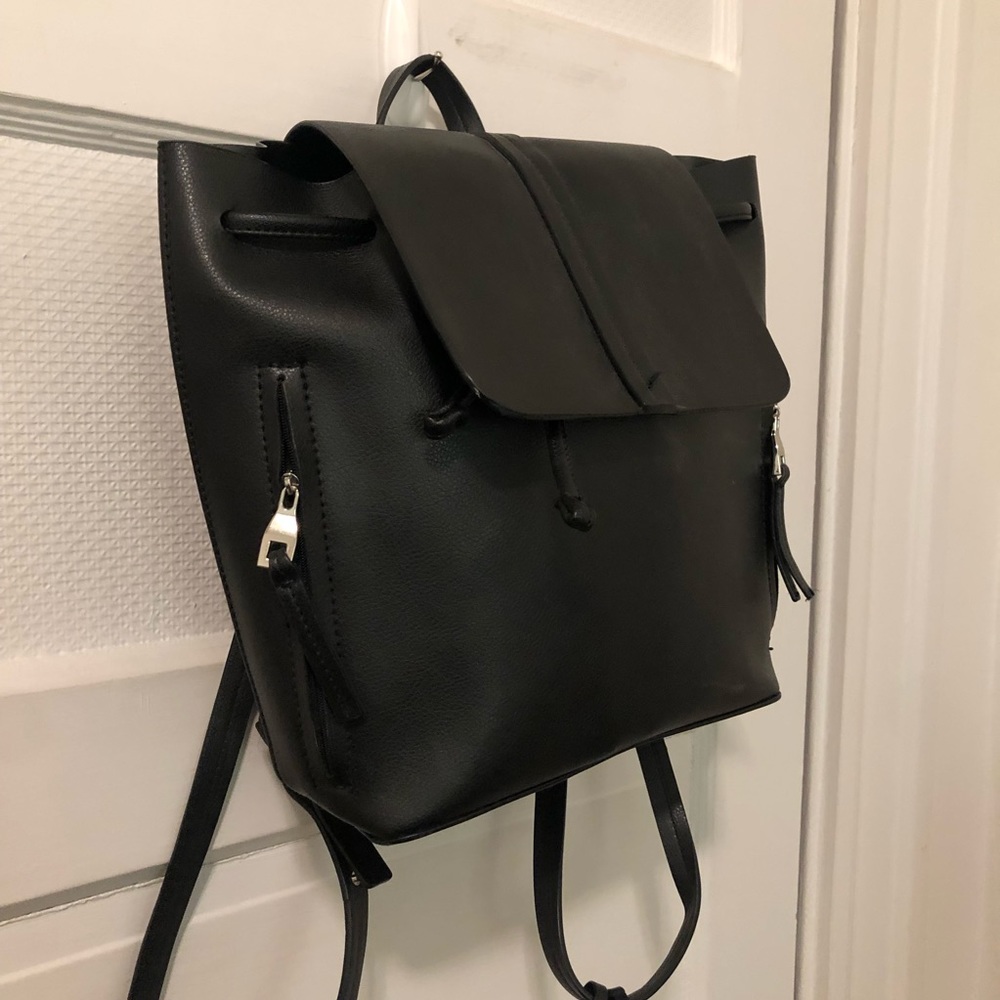 Black leather-style backpack